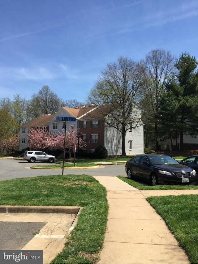 exterior space with a front lawn