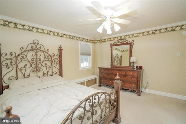 carpeted bedroom featuring ceiling fan, radiator heating unit, and crown molding