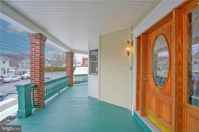 entrance to property with covered porch