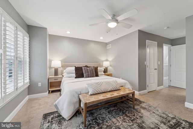 carpeted bedroom with ceiling fan