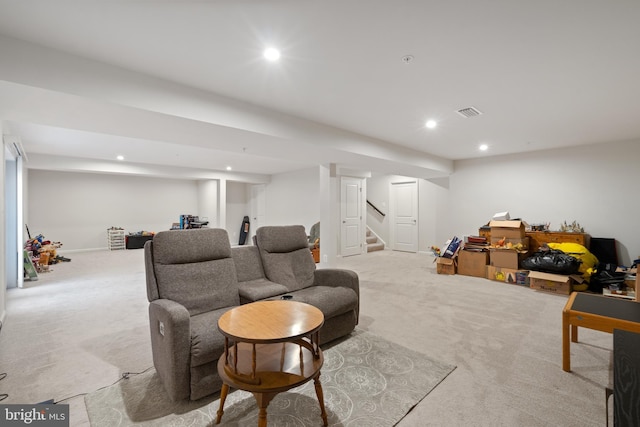 living room featuring light carpet