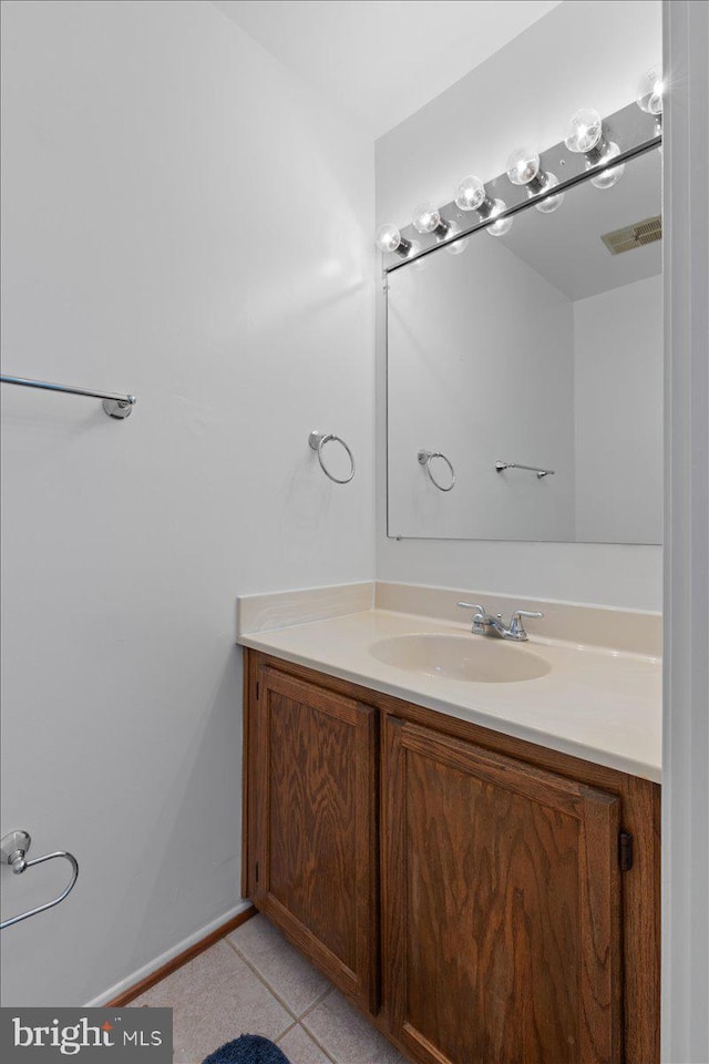 bathroom featuring vanity and tile patterned flooring