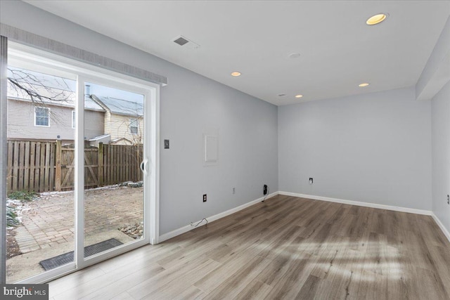 empty room featuring wood-type flooring