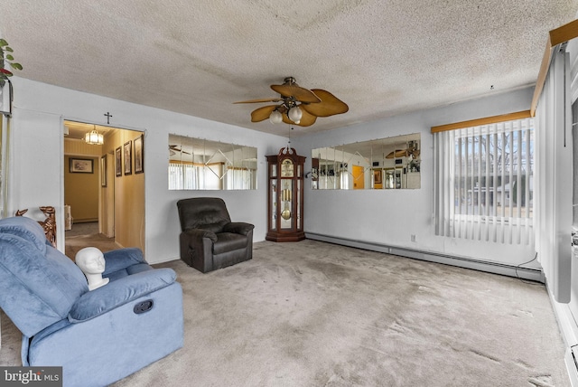 carpeted living area featuring a baseboard heating unit, a textured ceiling, and ceiling fan with notable chandelier