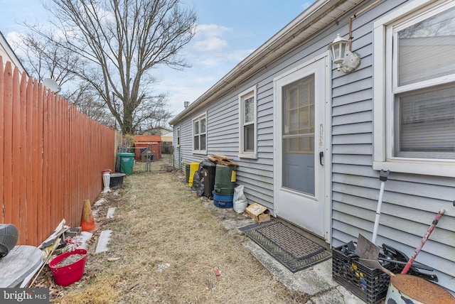 view of side of property with fence