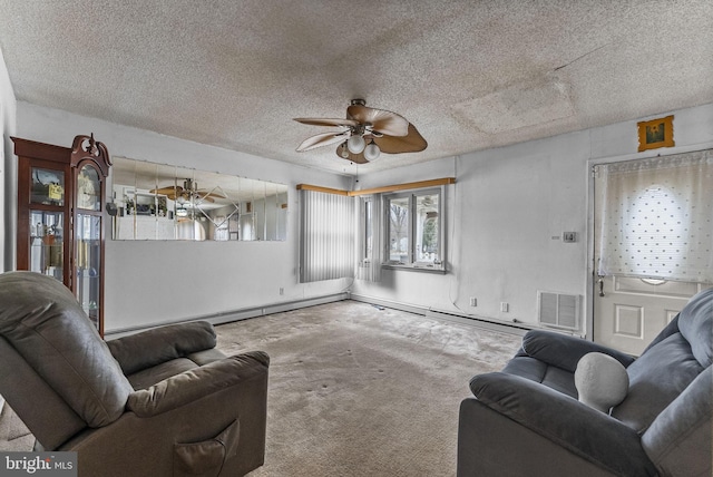 living area featuring carpet floors, ceiling fan, visible vents, and a textured ceiling