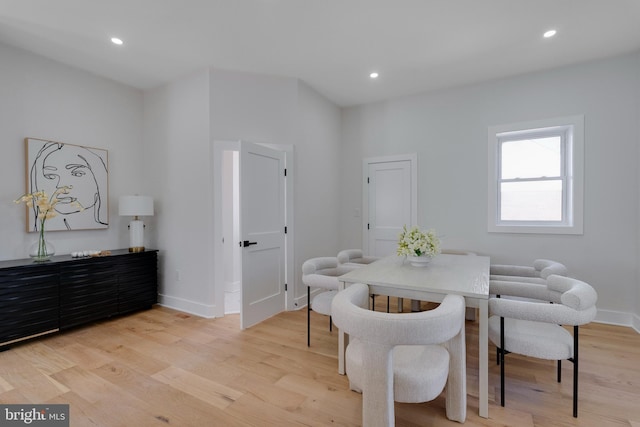 dining space featuring light hardwood / wood-style flooring