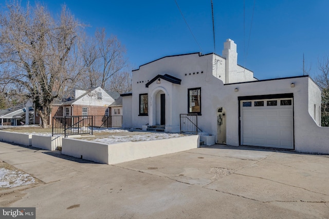 view of front of home featuring a garage