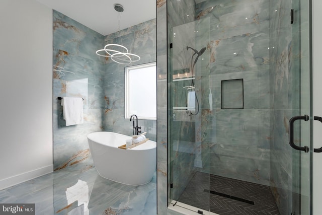 bathroom with independent shower and bath and tile walls