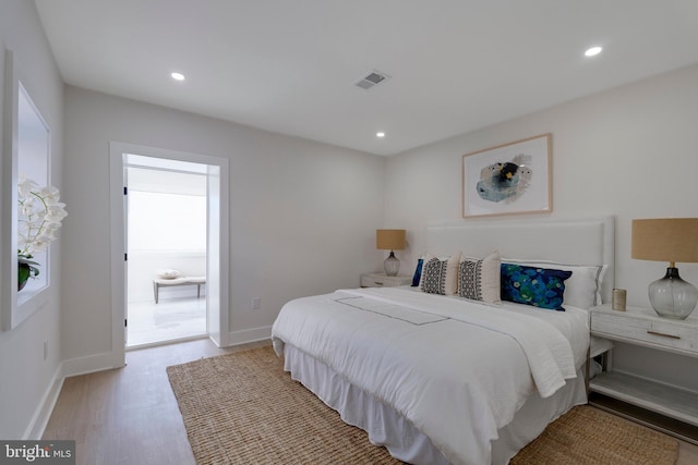 bedroom with light wood-type flooring