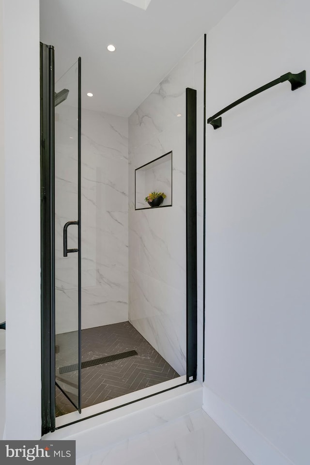 bathroom with an enclosed shower