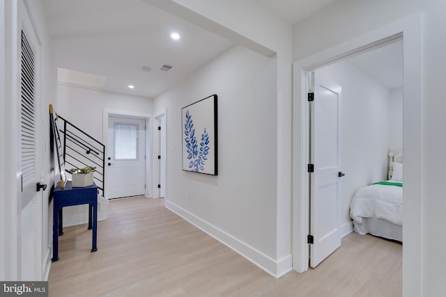 corridor featuring light wood-type flooring