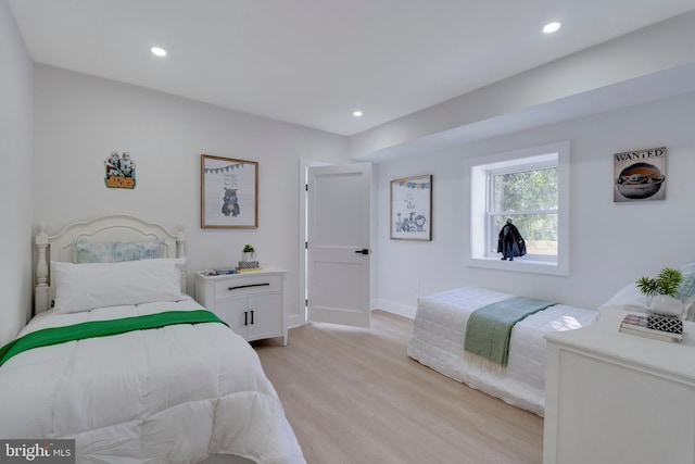 bedroom with light wood-type flooring