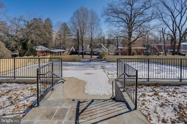 view of yard covered in snow