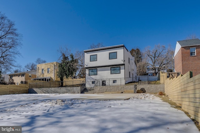 view of snow covered property