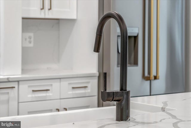 interior details featuring white cabinetry