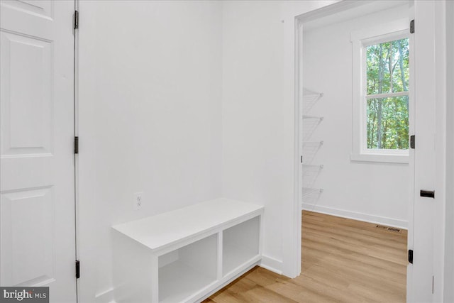 mudroom with light hardwood / wood-style flooring