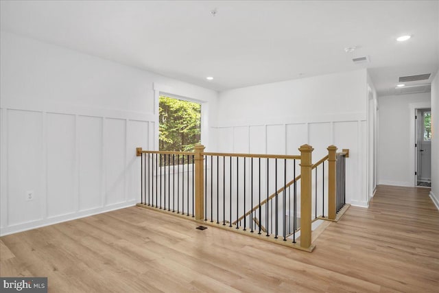 hallway featuring light hardwood / wood-style flooring