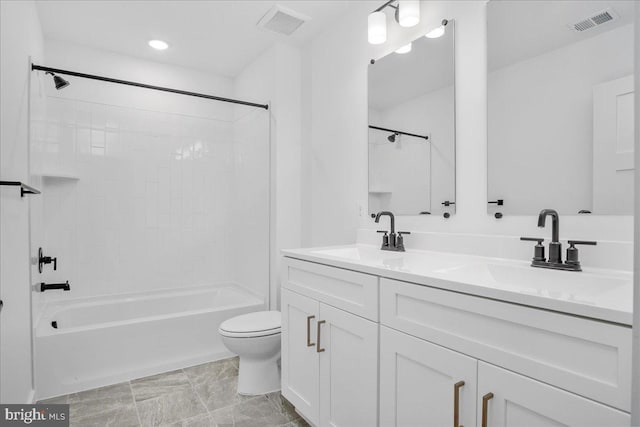 full bathroom with tub / shower combination, toilet, and vanity