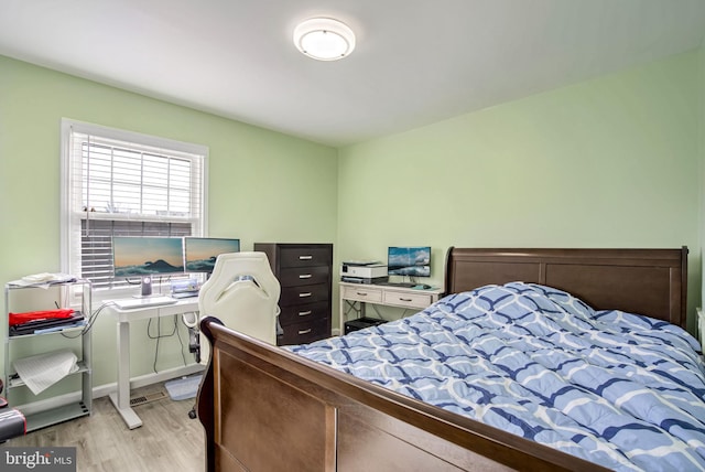 bedroom featuring light wood-type flooring