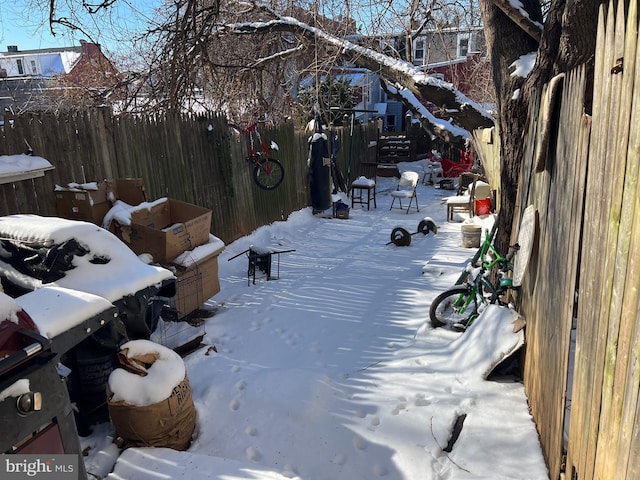 view of yard covered in snow