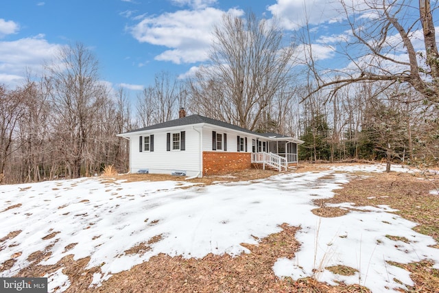 view of snow covered property