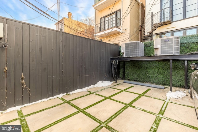 view of patio with cooling unit