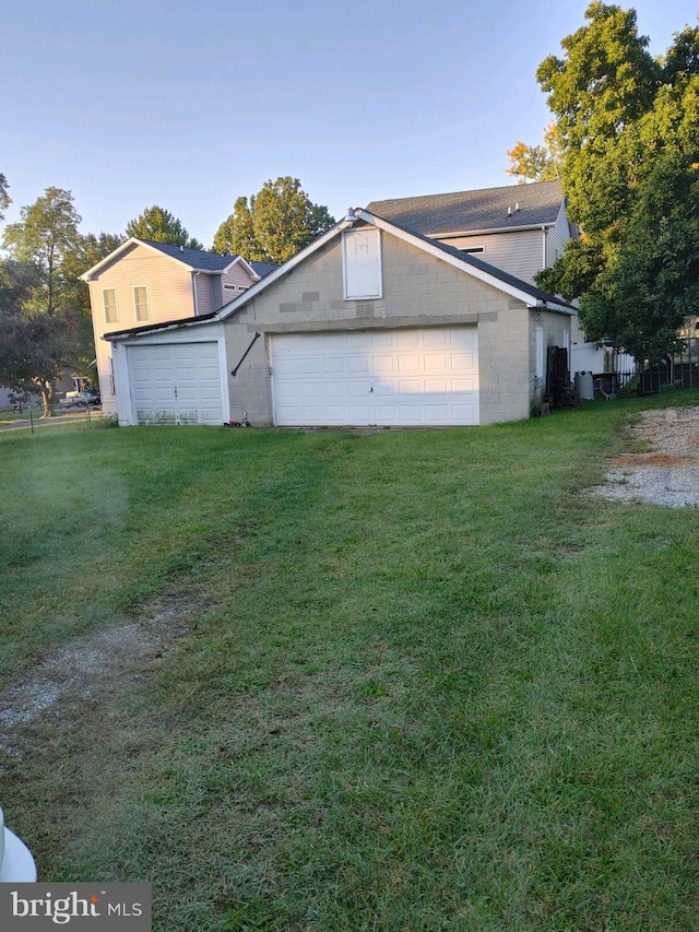 view of home's exterior with a yard