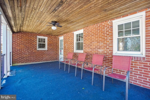 view of patio / terrace featuring ceiling fan