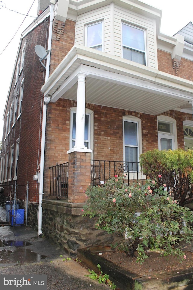 view of home's exterior with covered porch