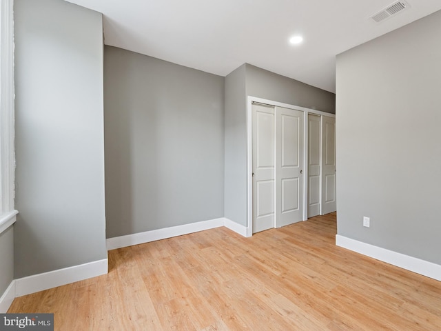 unfurnished bedroom featuring light hardwood / wood-style flooring