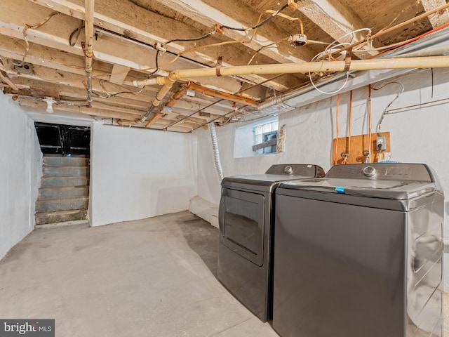 laundry area with washer and clothes dryer