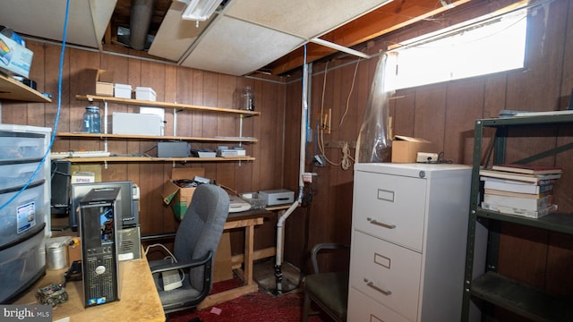 office space with wooden walls