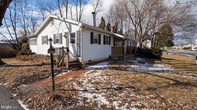 view of snow covered property