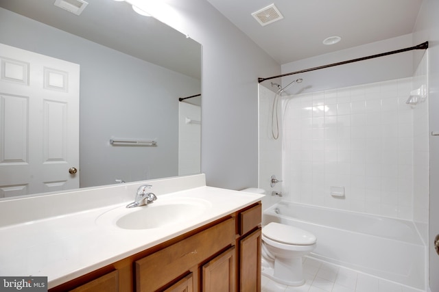 full bathroom with tile patterned flooring, vanity, bathing tub / shower combination, and toilet