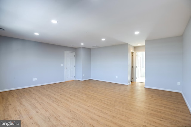 empty room with light wood-type flooring