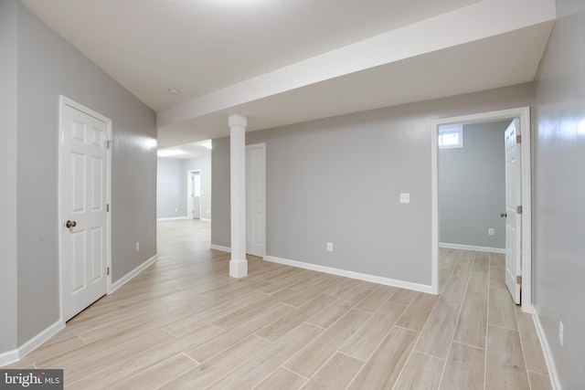 basement with light wood-type flooring