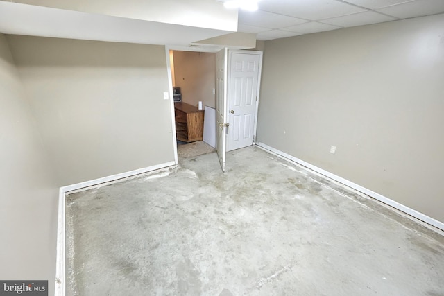 interior space featuring a paneled ceiling