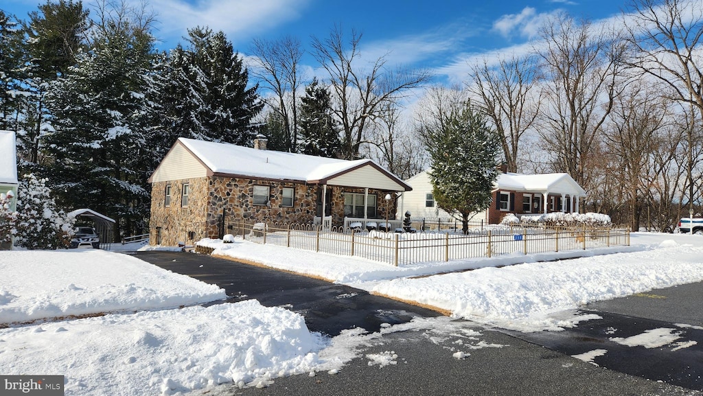 view of snow covered property