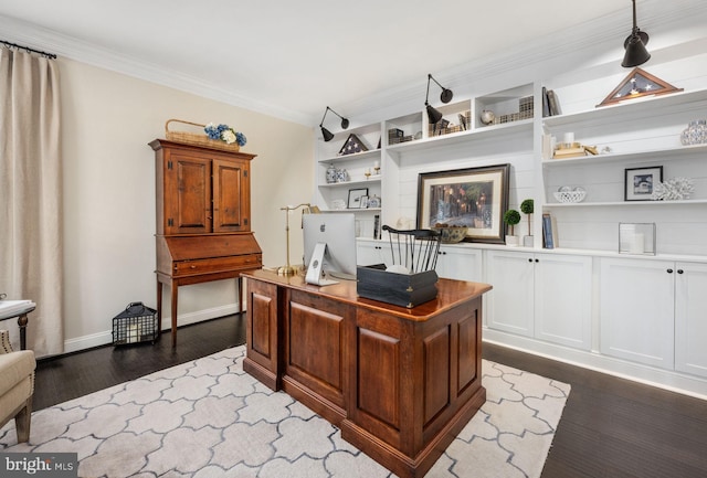 office space with ornamental molding and dark hardwood / wood-style flooring