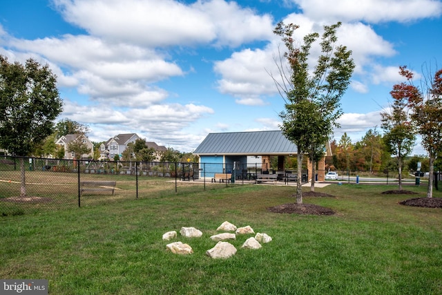 surrounding community featuring a yard