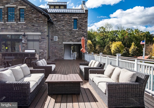 deck featuring an outdoor hangout area