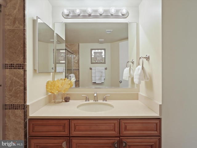 bathroom featuring vanity and walk in shower