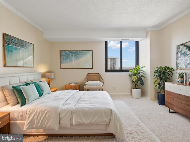 bedroom with crown molding, light colored carpet, and a textured ceiling