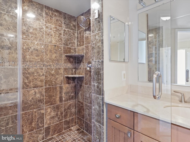 bathroom featuring vanity and walk in shower