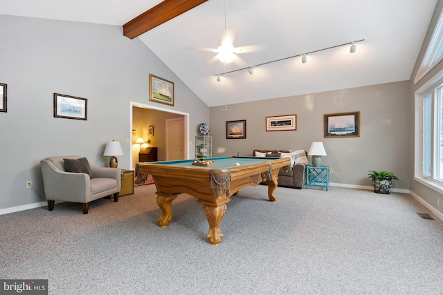 rec room featuring beam ceiling, plenty of natural light, and light carpet