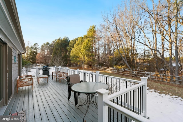 wooden deck featuring grilling area