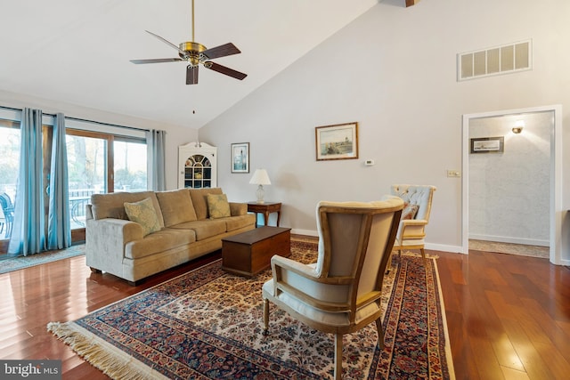 living room featuring high vaulted ceiling, hardwood / wood-style floors, and ceiling fan