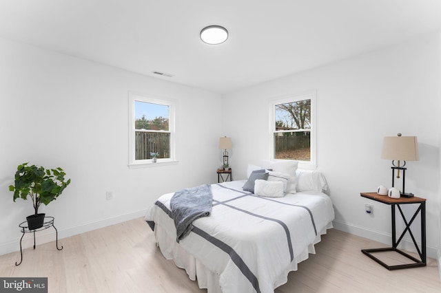 bedroom featuring light hardwood / wood-style flooring