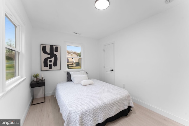 bedroom featuring light hardwood / wood-style flooring